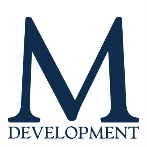 cropped-WhatsApp-Image-2023-03-06-a-16.34.26 Logo de l'entreprise de communication M Development